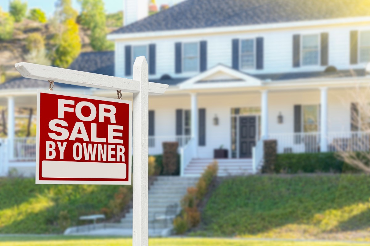 For sale sign outside a Texas home eligible for VA loan and down payment assistance